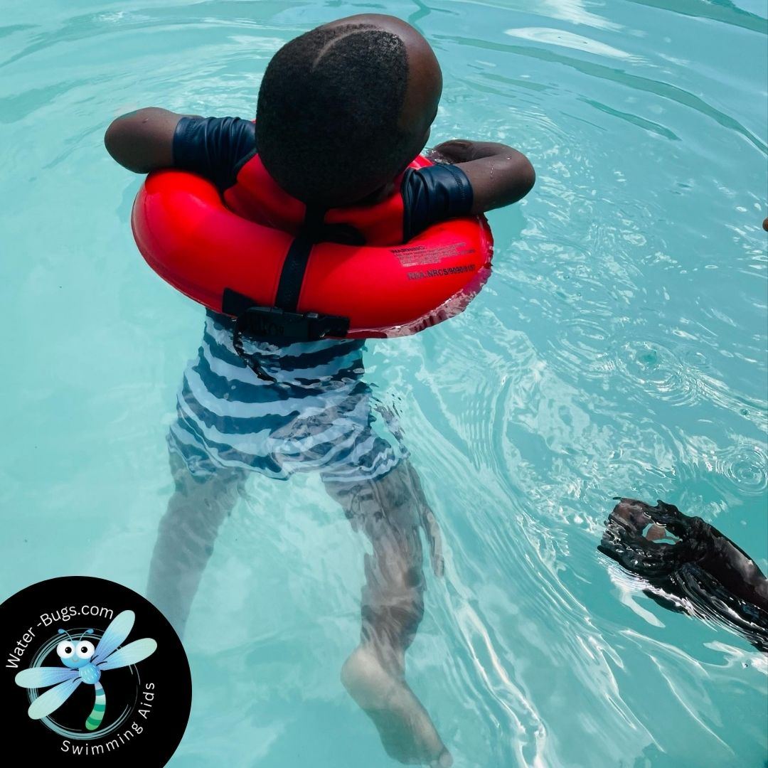 Child swimming freely in the pool with Water-Bugs