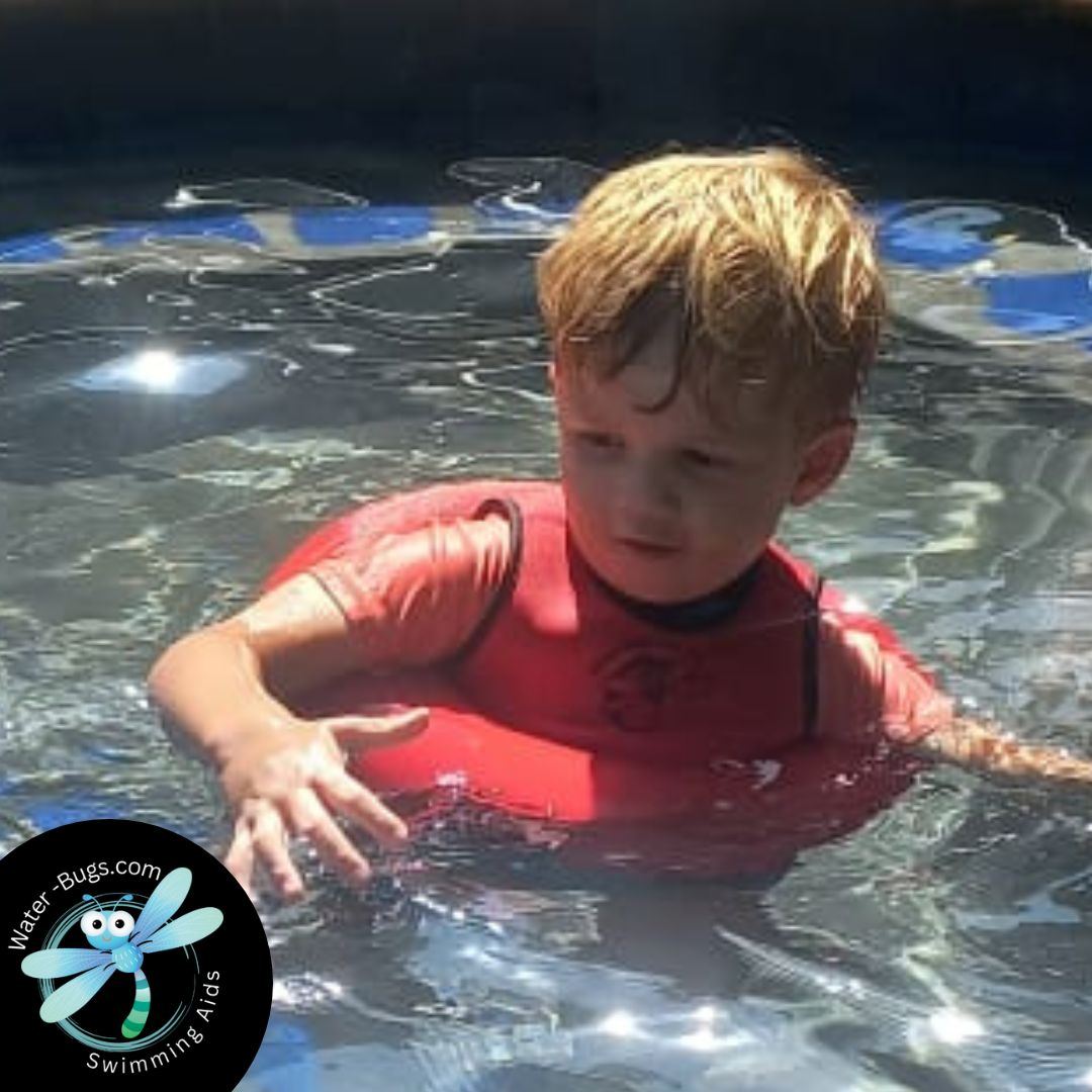 Happy child in the pool with Water-Bugs